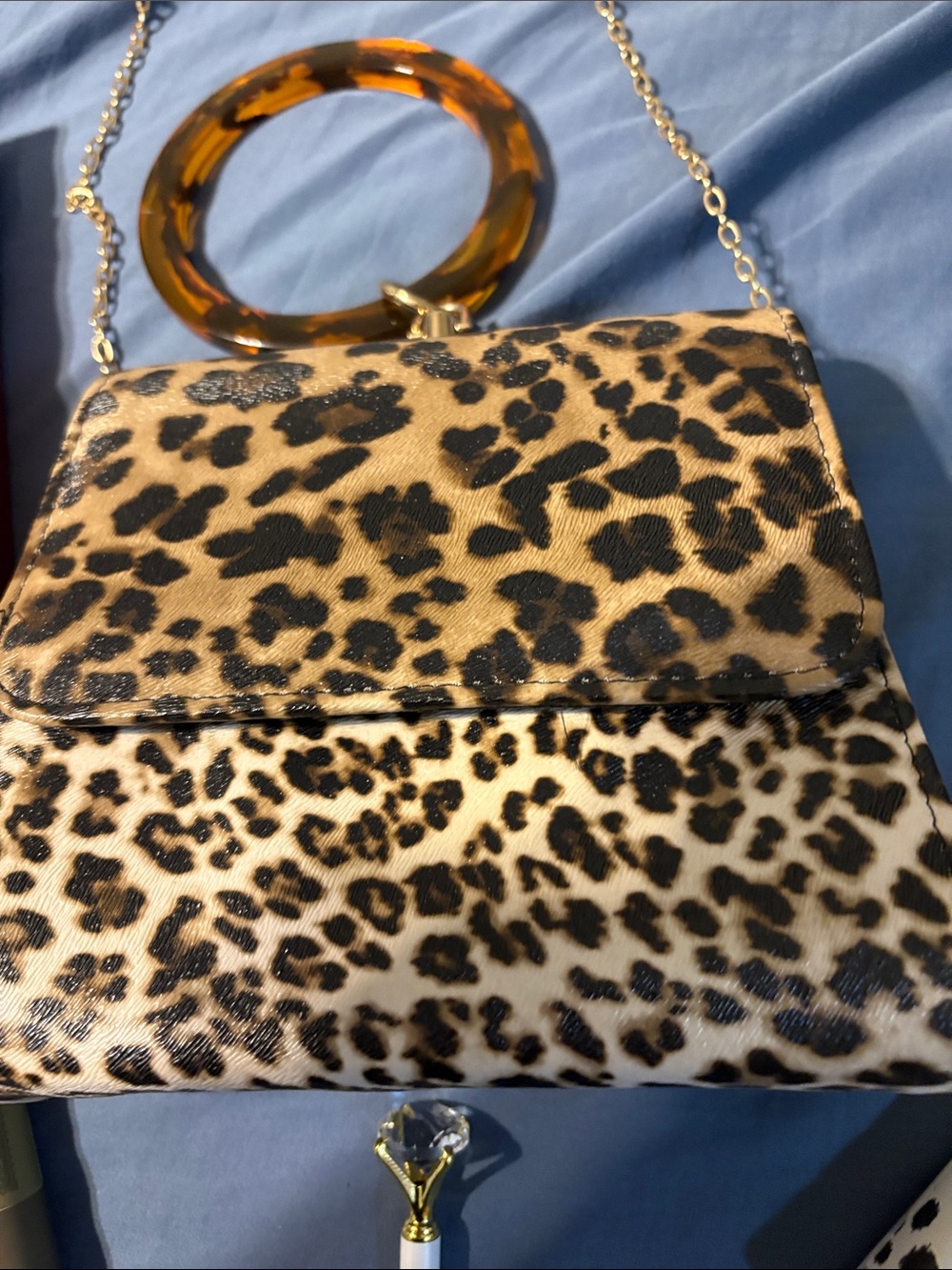 Leopard Print Crossbody Bag with Tortoiseshell Handle, bracelet and other items. - Picture 6 of 13